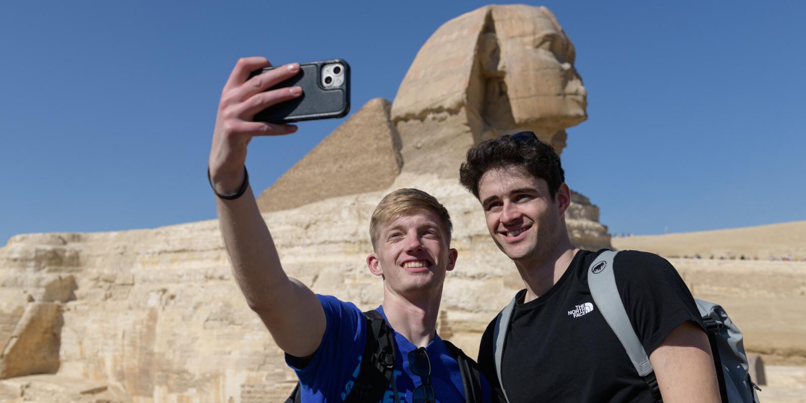 two boys taking a selfie at the sphinx