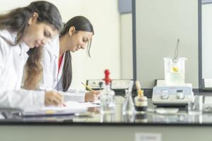 Two girls working in a lab