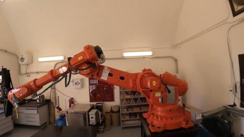 An orange machine in a lab