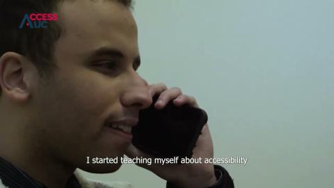 A male is talking on the phone