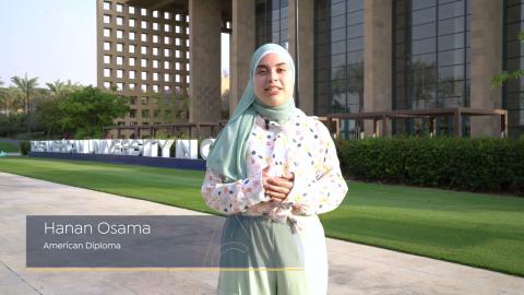A veiled female is standing in a garden in front of a building. Text: Hanan Osama, American Diploma