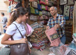 A girl shopping in Muizz street