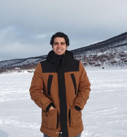 Study abroad student smiling in snowy Helsinki during his study abroad semester